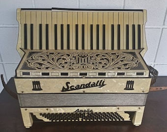 Vintage Scandalli 120 piano accordion Amelia with old beaten case