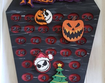 May include: A black wooden countdown calendar shaped like a coffin with red circles and numbers counting down the days to Halloween and Christmas. The calendar features a Jack Skellington character, a pumpkin, and a Christmas tree.