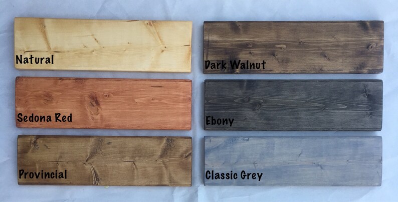 K&ouml;nnte beinhalten: Sechs Holzproben, die in verschiedenen Farben gebeizt sind: natur, dunkelbraun, Sedona-Rot, Ebenholz, rustikal und klassisches Grau.