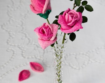 A Knitted Rose - a very real looking knitted flower made with delicate 4 ply wool and florist wire and tape for excellent final effect.
