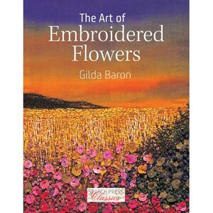 May include: A book titled The Art of Embroidered Flowers by Gilda Baron. The cover features a landscape scene with a sunset sky, a golden field, and a foreground filled with pink, red, and purple embroidered flowers. Search Press Classics logo.