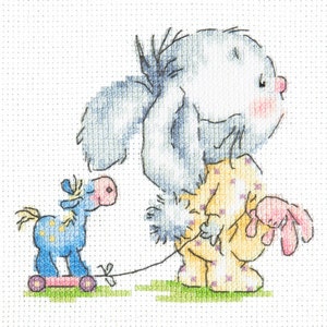 May include: A grey bunny in pyjamas pulls a blue toy horse on wheels. The bunny is holding a pink bunny doll.