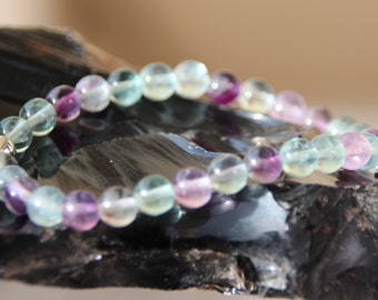 fluorite bracelet; silver charm