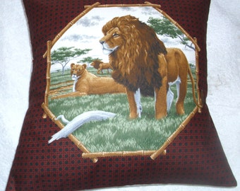 On Safari  Lions and Lioness on a  grassy plain cushion pillow