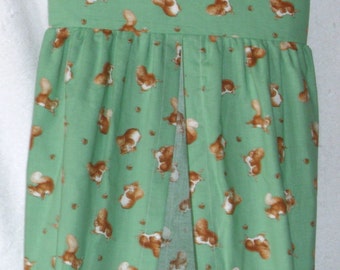 Squirrel Nutkin on green nappy stacker