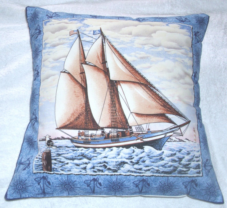 yacht sailing on a calm sea cushion pillow image 1