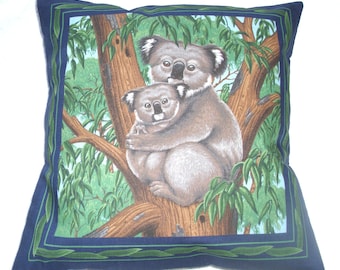 cushionA Koala bear nursing her baby cushion.