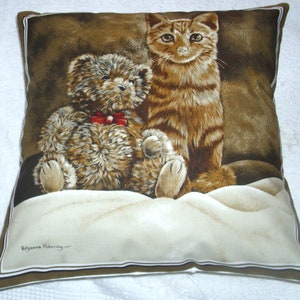 Pretty Ginger Kitten with her Teddy cushion pillow