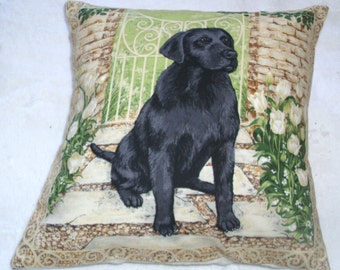 A lovely Black Labrador waiting by the garden gate cushion pillow