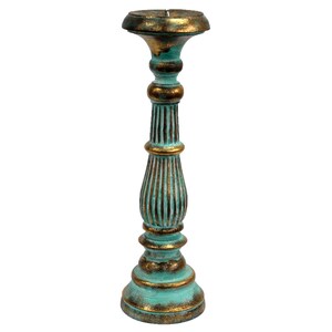 May include: A tall, teal blue and gold candle holder with a fluted design. The holder is made of wood and has a distressed finish.