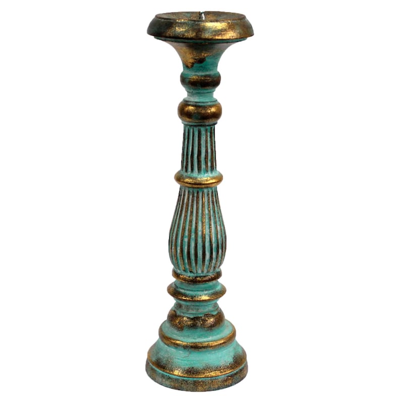 May include: A tall, teal blue and gold candle holder with a fluted design. The holder is made of wood and has a distressed finish.