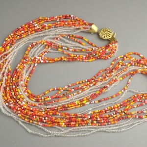 Bellissima collana multifilo, perline di vetro rosso-arancio vintage