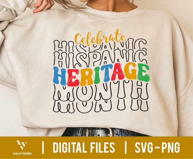 May include: A white sweatshirt with the text "Celebrate Hispanic Heritage Month" in colorful, wavy letters.