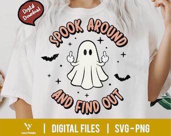 May include: A white t-shirt with a pink and black graphic design featuring a ghost with its middle fingers up and the text "Spook Around and Find Out".