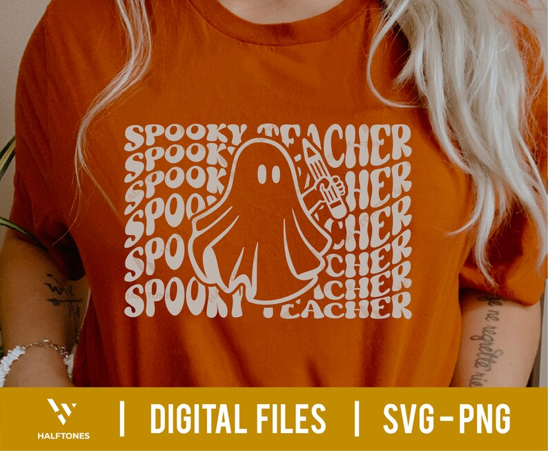 May include: Orange t-shirt with a white ghost holding a pencil and the text "Spooky Teacher" repeated in a retro font.