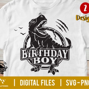 May include: A white t-shirt with a black dinosaur graphic and the text "Birthday Boy".