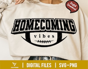 May include: A white sweatshirt with a black graphic design that says "Homecoming vibes" with a football graphic underneath.