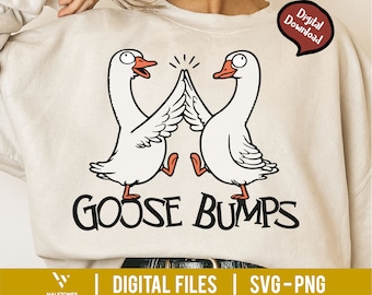 May include: A white sweatshirt with a graphic of two cartoon geese giving each other a high five. The text "Goose Bumps" is printed below the geese.