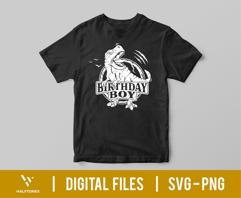 May include: Black t-shirt with a white graphic of a dinosaur roaring with the text "Birthday Boy" in a circle.