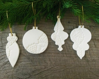 Set of 4 Christmas bubble shaped ornaments with partially lace imprint