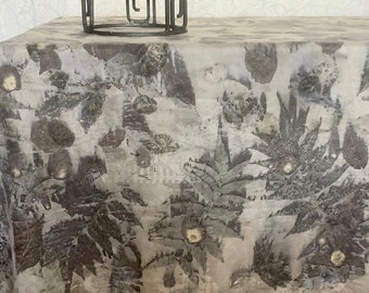 Vintage linen tablecloth with grey eco-prints and mauve background