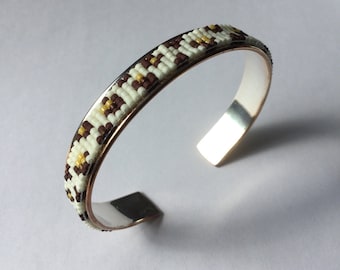 Bangle, open rush, bead weaving Panther pattern