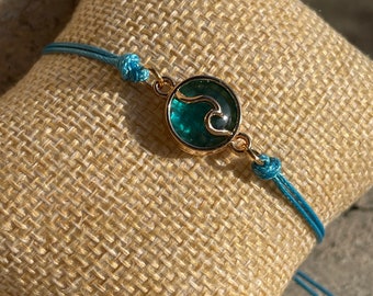 Pulsera azul, pulsera cordón corredizo, pulsera “ola”