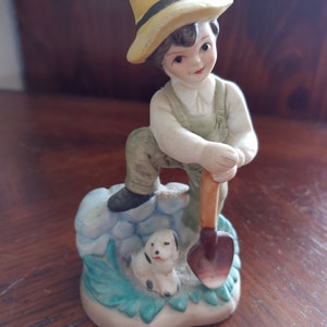 Vintage Boy Dog with Shovel Figurine