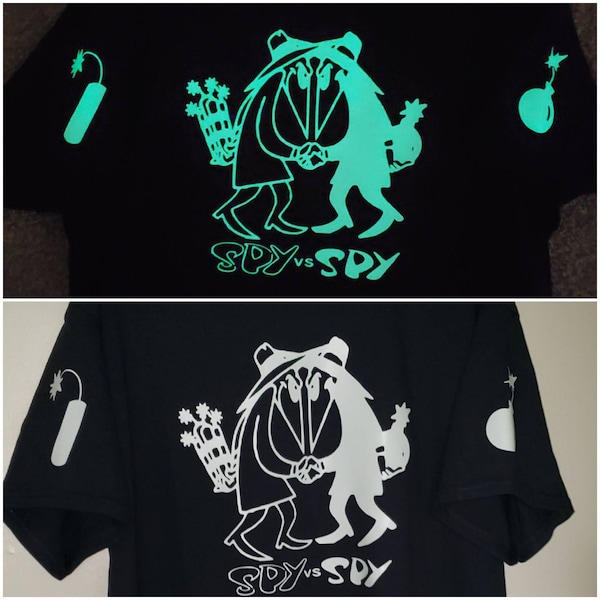 Spy vs. Spy GLOW in the dark t shirt. Size men's extra large. Explosives on sleeves. NEW.  Mad magazine.