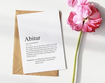 May include: A white card with the word "Abitur" in bold black text. The card defines the word as a German high school diploma, explaining that it is awarded to students who have successfully completed their studies. The card also lists synonyms for the word, including "Lern-Marathon Absolvent", "Zähne-Zusammenbeißer", and "Zertifizierter Besserwisser".