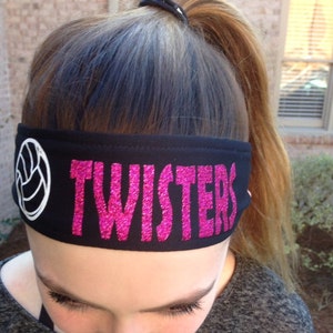 May include: Black headband with a white volleyball graphic and the word "TWISTERS" in pink glitter.