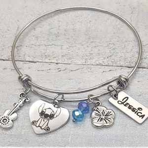 Personalized Custom Engraved Name Charm Lilo & Stitch Charm bangle bracelet with hibiscus flower, guitar,  blue beads, Ohana Family Bracelet