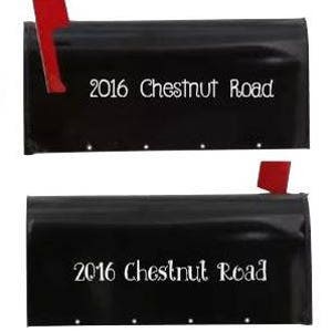 May include: Black mailbox with a red flag and white lettering that reads "2016 Chestnut Road".