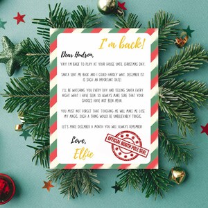 May include: A red and green striped card with a handwritten note that reads "Dear Hudson, I'm back!" The note is from an elf and includes a red stamp that says "Official North Pole Seal".