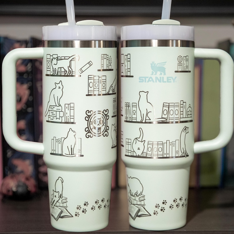 a couple of white cups sitting on top of a table