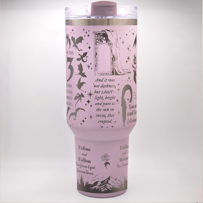a pink cup with a picture of a woman on it