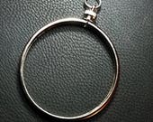 Coin Bezel for Ike Silver Dollar sized coin. 1.5 quot - (If you want to make the coin into a necklace pendant) - No coin included.