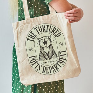 Bolso de mano con forma de gato del Departamento de Poetas Torturados