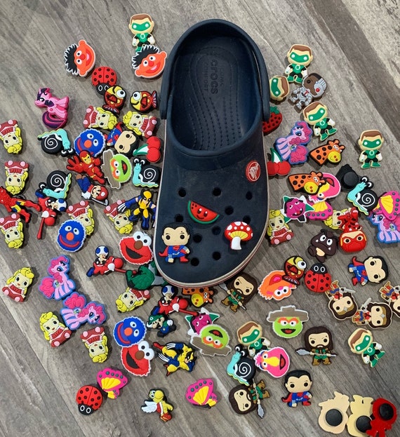 black crocs with charms