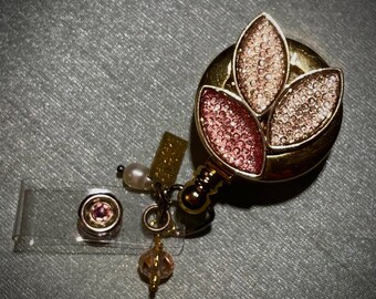 Porta badge arrotolabile in stile moderno Déco con foglie rosa scintillanti e dettagli in cristallo