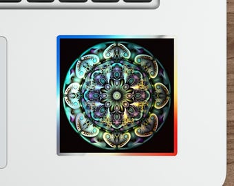 May include: A square sticker featuring a colorful, intricate mandala design. The mandala has a central floral pattern with radiating symmetrical elements in shades of teal, purple, and yellow, set against a black background. The sticker is bordered by a gradient of blue and red.