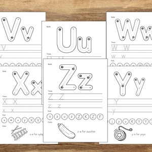 May include: Black and white printable worksheet for learning the alphabet. The worksheet features the letters V, U, W, X, Y, and Z with dotted lines to help children trace the letters. The worksheet also includes a section for children to find the letter, trace the letter, and color the letter. The worksheet also includes a picture of a xylophone, a zucchini, and a yo-yo.