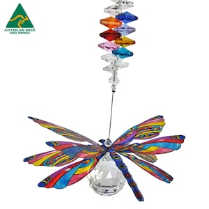 May include: A crystal suncatcher featuring a colourful butterfly design. The butterfly has pink, blue, red, yellow and green wings. The suncatcher hangs from a crystal prism chain.