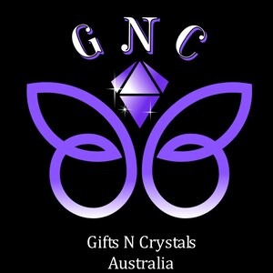 May include: A purple butterfly with a diamond in the center. The text "Gifts N Crystals Australia" is below the butterfly.