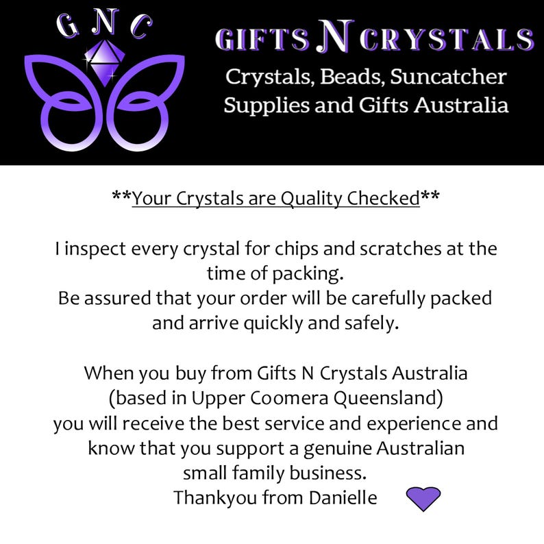 May include: A white informational sign with black text featuring the Gifts N Crystals logo, a purple butterfly icon, and a diamond graphic. The text details quality checks for crystals, beads, and suncatcher supplies from Australia.