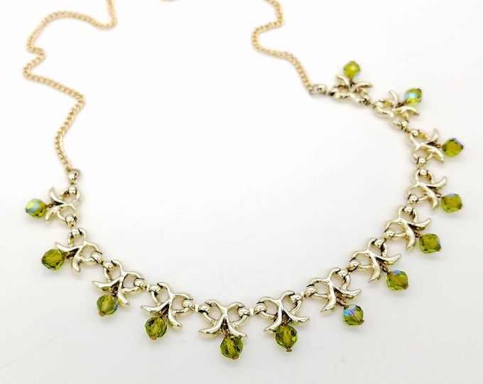 Featured listing image: Vintage Aurora Borealis Peridot Green Crystal Drop & Gold Tone Metal Bow Necklace - 25"