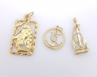 Vintage gold plated ship anchor pendant.
