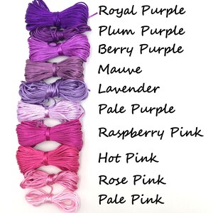 May include: A collection of colorful cord bundles in shades of purple and pink, including Royal Purple, Plum Purple, and Raspberry Pink. The image displays the color names next to each bundle. Ideal for crafting and jewelry making.