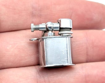 Vintage Japanse miniaansteker, zakaansteker, chroomroestvrij staal