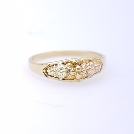 rose gold ring with blue stone